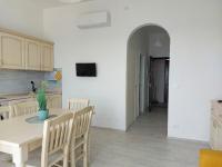 Kuchyňa alebo kuchynka v ubytovaní Una finestra sul mare Home 2