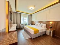 Postel nebo postele na pokoji v ubytování Fortune Plaza Hotel, Dubai Airport