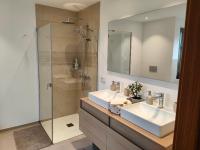 A bathroom at Garden Suites luxury apartment