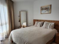 A bed or beds in a room at Garden Suites luxury apartment