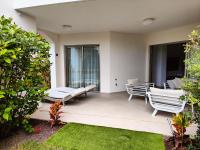 A garden outside Garden Suites luxury apartment