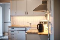 Kuchyň nebo kuchyňský kout v ubytování Askegaarden Apartments