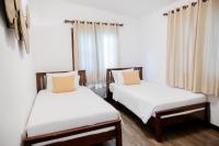 Postel nebo postele na pokoji v ubytování Tolani Southgate Villa Chiang Mai
