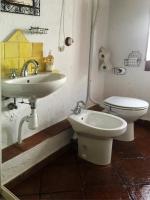 a bathroom with a sink and a toilet at La Carrihuela in Algodonales