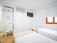 Posteľ alebo postele v izbe v ubytovaní Texeda Room Suites