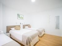 Posteľ alebo postele v izbe v ubytovaní Texeda Room Suites
