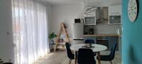 Kuchyň nebo kuchyňský kout v ubytování Urban Apartment Vukić