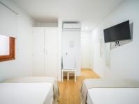 Posteľ alebo postele v izbe v ubytovaní Texeda Room Suites