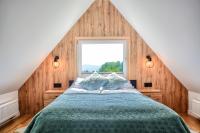 Posteľ alebo postele v izbe v ubytovaní Westa Apartamenty