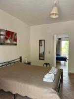 Postel nebo postele na pokoji v ubytování Seapine Studios