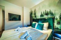 Posteľ alebo postele v izbe v ubytovaní Turmalin K2 - Apartament Rodzinny - Prywatna SAUNA