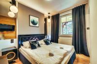 Posteľ alebo postele v izbe v ubytovaní Kwarc G2 - Apartament Rodzinny - Prywatna SAUNA