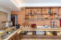 Kuchyň nebo kuchyňský kout v ubytování Dream International Hotel