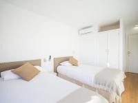 Posteľ alebo postele v izbe v ubytovaní Texeda Room Suites