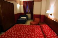 Posteľ alebo postele v izbe v ubytovaní Hotel Iris Crillon