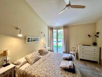 Łóżko lub łóżka w pokoju w obiekcie Confortable Chalet con piscina