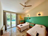 Łóżko lub łóżka w pokoju w obiekcie Confortable Chalet con piscina