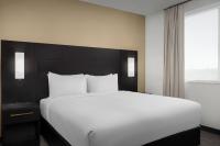 Residence Inn by Marriott Indianapolis Plainfieldにあるベッド