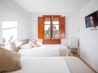 Posteľ alebo postele v izbe v ubytovaní Texeda Room Suites