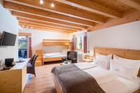 Posteľ alebo postele v izbe v ubytovaní Hotel Regnum Zegg