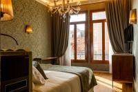 Posteľ alebo postele v izbe v ubytovaní Hotel Canaletto