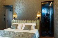 Posteľ alebo postele v izbe v ubytovaní Hotel Canaletto