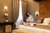 Posteľ alebo postele v izbe v ubytovaní Hotel Canaletto