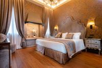 Posteľ alebo postele v izbe v ubytovaní Hotel Canaletto
