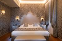 Posteľ alebo postele v izbe v ubytovaní Hotel Canaletto