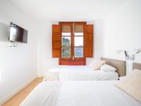 Posteľ alebo postele v izbe v ubytovaní Texeda Room Suites