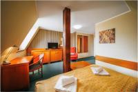 Postel nebo postele na pokoji v ubytování Hotel U Leva