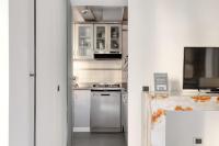 Kuchyňa alebo kuchynka v ubytovaní Brera - Bright and cosy 2 bedrooms apt- Via Solferino