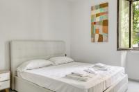 Posteľ alebo postele v izbe v ubytovaní Brera - Bright and cosy 2 bedrooms apt- Via Solferino