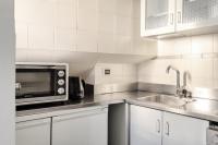 Kuchyňa alebo kuchynka v ubytovaní Brera - Bright and cosy 2 bedrooms apt- Via Solferino