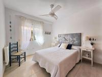 A bed or beds in a room at PARAISO ARONA I - Casa en Mar de Cristal La Manga