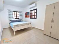 Ein Bett oder Betten in einem Zimmer der Unterkunft Family-TIME בית פרטי לנופש משפחתי באילת