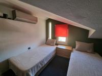 Postel nebo postele na pokoji v ubytování Villa Xenia