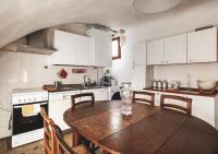 A kitchen or kitchenette at Fiamma Apartment