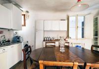 A kitchen or kitchenette at Fiamma Apartment