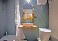 A bathroom at Fiamma Apartment