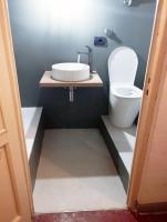 A bathroom at Fiamma Apartment
