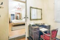 A bed or beds in a room at Fiamma Apartment