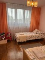 Posteľ alebo postele v izbe v ubytovaní Apartament Centrum