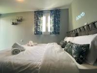 Posteľ alebo postele v izbe v ubytovaní Rooftop Apartment with Garden in Ioannina