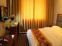 169 Business Hotelにあるベッド