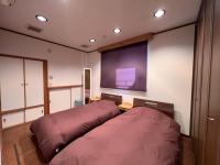 Misato Guest Houseにあるベッド