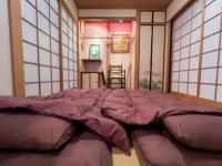 Misato Guest Houseにあるベッド