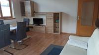 Televízia a/alebo spoločenská miestnosť v ubytovaní Apartment Guem