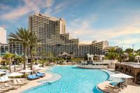 a view of a resort with a pool and buildings at Orlando World Center Marriott in Orlando