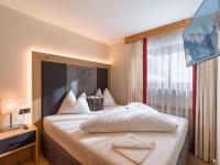 Posteľ alebo postele v izbe v ubytovaní Wellnessresort Seiwald **** Superior